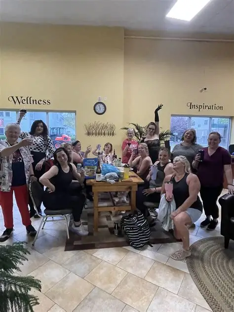 Members celebrating together at Sara's Health and Fitness